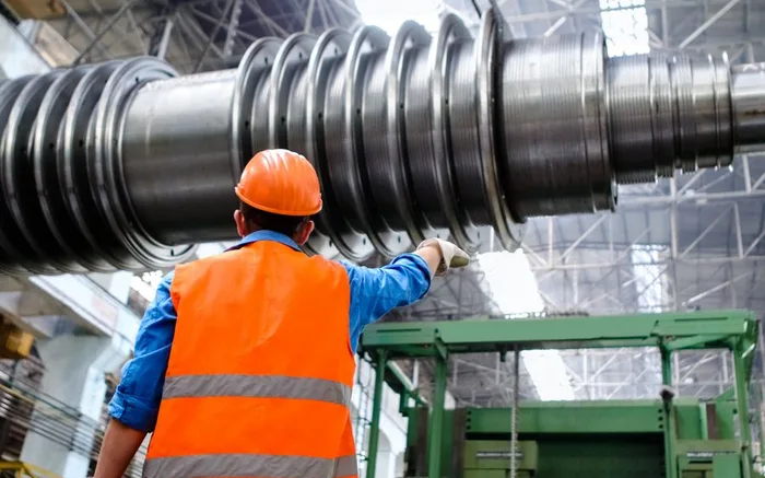 An engineer inspecting plant machinery